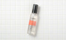 iroha TREATMENT LOTION sobre azulejo branco